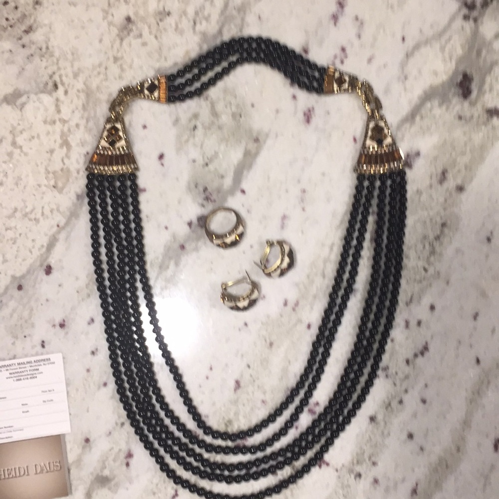 Heidi Daus Art Deco neck, omega ears, ring